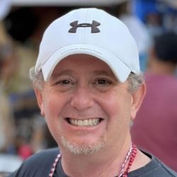 Peak Design - Updated profile pic 1/2024. Every time I get to design a new project this smile is glued to me nonstop.