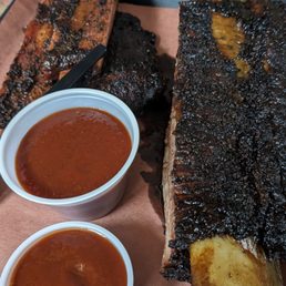 Pork ribs and a beef rib. Pork ribs and a beef rib.