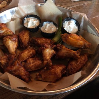 Growlers Pourhouse - Jerk Wings W Celery & Blue Cheese (1 Dozen) - American Near Me - Charlotte, North Carolina Growlers Pourhouse - Jerk Wings W Celery & Blue Cheese (1 Dozen) - American Near Me - Charlotte, North Carolina