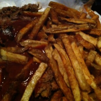 The Loft Tavern - Pulled pork sandwich (to-go).  What a mess but totally worth it! - Bars Near Me - Ludlow, Vermont