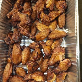 Hero’s Bar & Grill - chicken wings in a foil container - Barbeque Near Me - Girard, Kansas Hero’s Bar & Grill - chicken wings in a foil container - Barbeque Near Me - Girard, Kansas