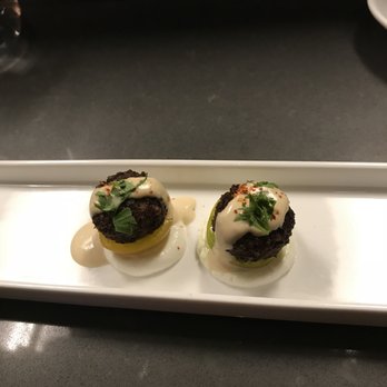Chloe - A comp from the chef for our first time in: mini falafel on tomato halves - New American Near Me - Washington, DC, District of Columbia