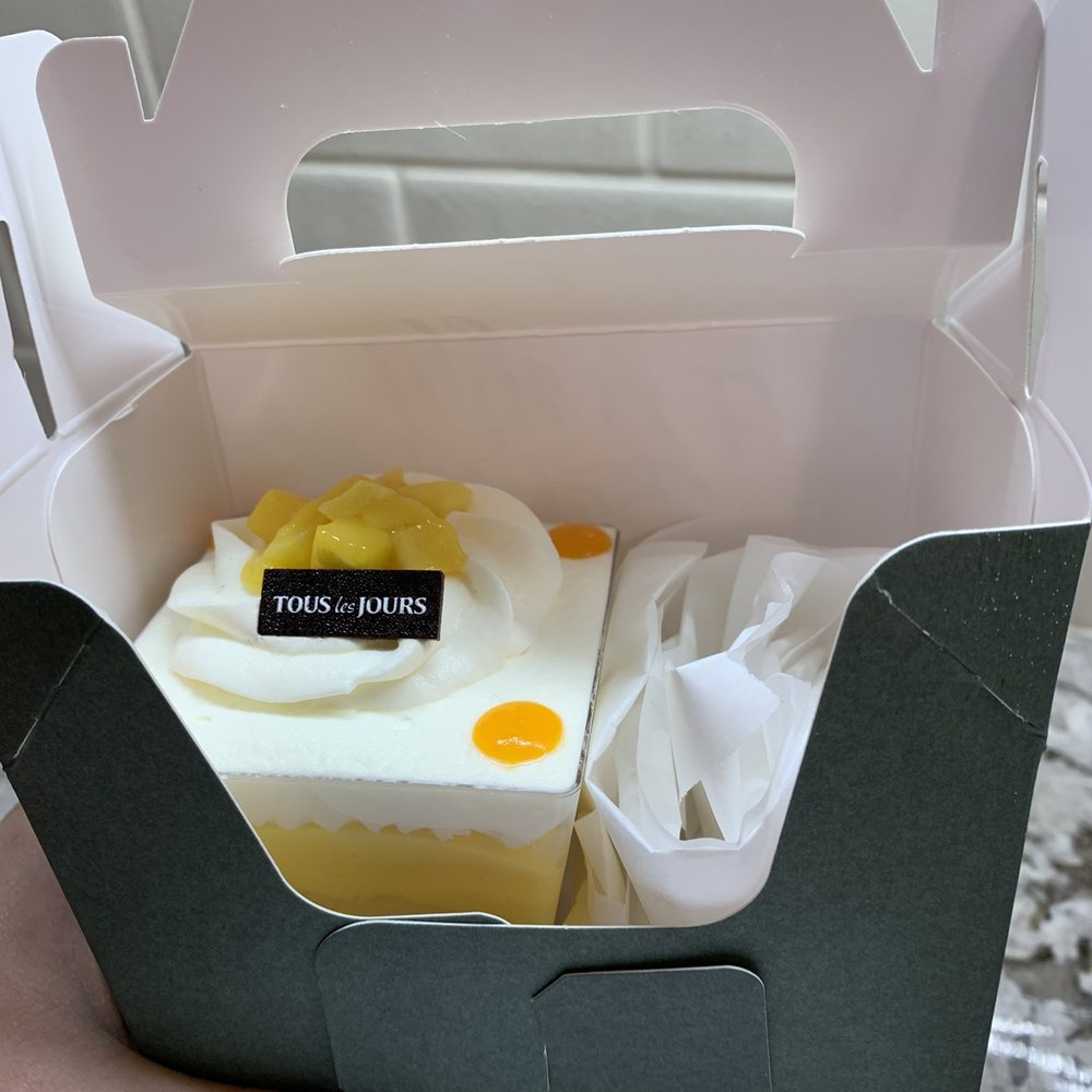 Tous Les Jours - Packing your desserts to go is done with care (mango cup) - Bakeries Near Me - Beaverton, Oregon Tous Les Jours - Packing your desserts to go is done with care (mango cup) - Bakeries Near Me - Beaverton, Oregon