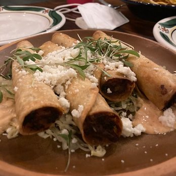 Buena Vida Cantina - Chicken Taquitos! I am always impressed when the garnish actually adds flavor. The chipotle cream was fire. - Mexican Near Me - San Francisco, California