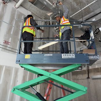 Touch Of Power Solutions - Touch of power solutions on scissors lift - Electricians Near Me - Charlotte, North Carolina Touch Of Power Solutions - Touch of power solutions on scissors lift - Electricians Near Me - Charlotte, North Carolina