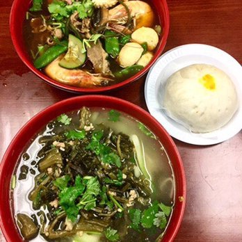 China Station - Pork bun, spicy noodle bowl (top), and minced pork bowl (bottom) - Noodles Near Me - Stony Brook, New York China Station - Pork bun, spicy noodle bowl (top), and minced pork bowl (bottom) - Noodles Near Me - Stony Brook, New York
