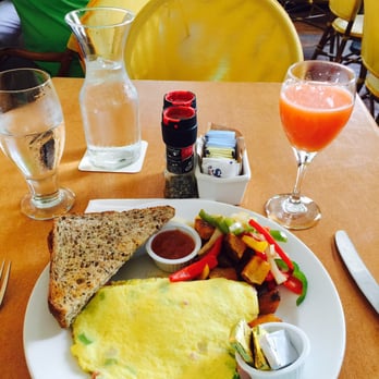 Sarabeth's Key West - Farmers omelet with 3 pepper potatoes and Four Flower Juice (Orange, pineapple, banana) 8 grain toast. Delicious! - American Near Me - Key West, Florida Sarabeth's Key West - Farmers omelet with 3 pepper potatoes and Four Flower Juice (Orange, pineapple, banana) 8 grain toast. Delicious! - American Near Me - Key West, Florida