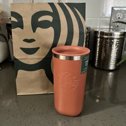 Cute travel tumbler made with 90% post-consumer recycled stainless steel and lid made with 100% recycled plastic.