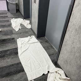 Towels on hallway floor