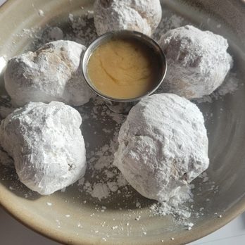 Louie's Wine Dive & Clayton Kitchen - BEIGNETS WITH RUM SAUCE - Wine Bars Near Me - Clayton, Missouri Louie's Wine Dive & Clayton Kitchen - BEIGNETS WITH RUM SAUCE - Wine Bars Near Me - Clayton, Missouri