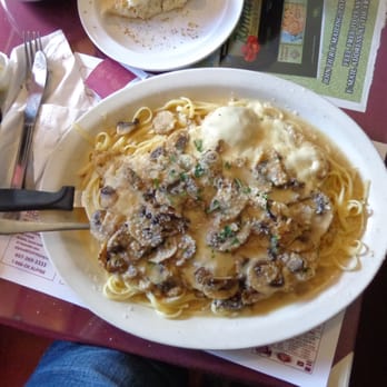 Roma Ristorante & Pizzeria - a plate of pasta with mushrooms - Pizza Near Me - Sidney, New York Roma Ristorante & Pizzeria - a plate of pasta with mushrooms - Pizza Near Me - Sidney, New York