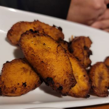 Chef Paz Restaurant - a plate of fried bananas - Peruvian Near Me - West Allis, Wisconsin Chef Paz Restaurant - a plate of fried bananas - Peruvian Near Me - West Allis, Wisconsin