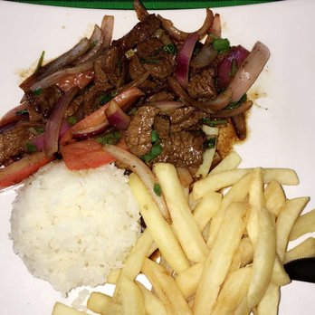 Fusion Peru - The Lomo Saltado! Marinated beef with veggies and a side of fries and white rice - Food Trucks Near Me - College Station, Texas Fusion Peru - The Lomo Saltado! Marinated beef with veggies and a side of fries and white rice - Food Trucks Near Me - College Station, Texas