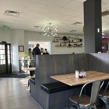 Eves Eatery - a table and chairs in a restaurant - Pizza Near Me - Carson City, Nevada Eves Eatery - a table and chairs in a restaurant - Pizza Near Me - Carson City, Nevada
