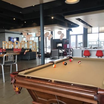 Aloft by Marriott Corpus Christi - Pool table with bar in the background - Hotels Near Me - Corpus Christi, Texas