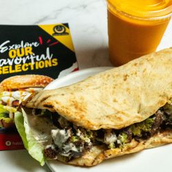 Halal Addicts - Falafel gyro and mango lassi