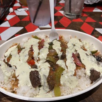 Condado Tacos - Rice Black Beans Bowl Base with steak and avocado ranch drizzle - Tacos Near Me - Mount Pleasant, South Carolina Condado Tacos - Rice Black Beans Bowl Base with steak and avocado ranch drizzle - Tacos Near Me - Mount Pleasant, South Carolina