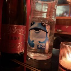 Sunn’s - Vibes + wine bottle + cute water dispenser