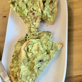 Maplewood Deli & Coffeehouse - Avocado toast w/ tomato & onions is so generous with avo which I LOVE! Amazing!!! New workday snack fo sho - Coffee & Tea Near Me - Maplewood, Missouri