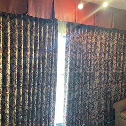 Track lighting over the same material on the drapes that made my Uncle Mike's 1970's leisure suit Track lighting over the same material on the drapes that made my Uncle Mike's 1970's leisure suit
