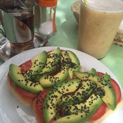 El Arbolito - Avocado toast w fresh melon and fig juice. Delicious!