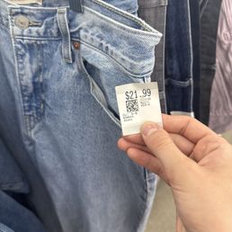 A pair of ripped Levi's jeans A pair of ripped Levi's jeans