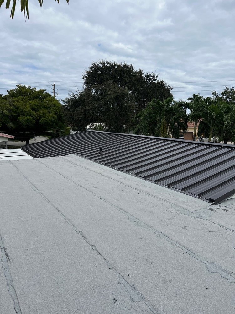 Slide of Stat Roofing and Sheetmetal