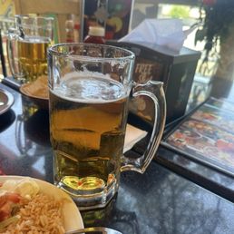 Draft modelo and mixed molcajete sizzling hot