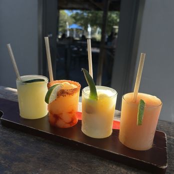 Midtown Spirits - Slushy flights  Cucumber, mangonada, dole whip, Hawaiian POG - Bars Near Me - Sacramento, California