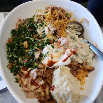 Crave Kabob - Crave Bowl (Magic in a Bowl!) - Spicy Rice, Chicken Shawarma, Tabbouleh Salad, Jerusalem Salad, 2x Baba Ghanoush, Tzatziki and Fire Sauce. - Mediterranean Near Me - Chicago, Illinois