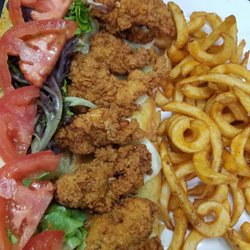 Badeaux's Seafood & Grill - Alligator po'boy with curly fries