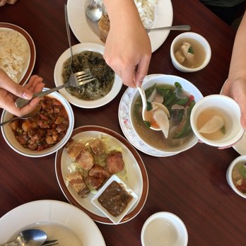 Tambayan - (Left to clockwise) Menudo, Laing, Sinigang, and Lechon Kawali. Already got a head start on eating some in this pic - Filipino Near Me - Portland, Oregon