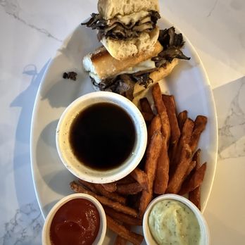 Floret - Portobello mushroom French dip with au jus served with yam fries and garden aioli dipping sauces - Vegetarian Near Me - Seattle, Washington