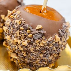 The Chocolate Shop by Nouveau - Caramel Apples, doused in delightful toppings!