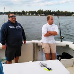 Marauder Charters and Cruises - The Captain and first mate making fun memories on the water. Thank you guys!