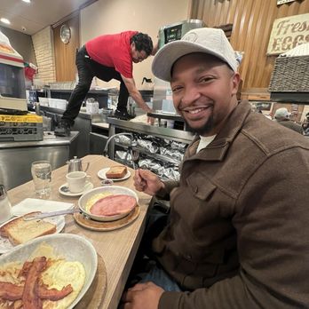Lou Mitchell's - One very happy breakfast man lol - Breakfast & Brunch Near Me - Chicago, Illinois Lou Mitchell's - One very happy breakfast man lol - Breakfast & Brunch Near Me - Chicago, Illinois