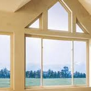 American Building Dynamics - a living room with large windows - General Contractors Near Me - Spotsylvania, Virginia