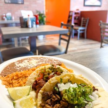 Tacos Madre - Al pastor and Carne pastor with rice and beans. - Mexican Near Me - Costa Mesa, California Tacos Madre - Al pastor and Carne pastor with rice and beans. - Mexican Near Me - Costa Mesa, California