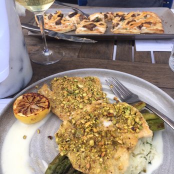 The Half Nelson - Pecan crusted barramundi, over cilantro lime rice and asparagus. - Bars Near Me - Davenport, Iowa