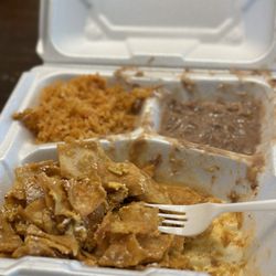 Don Reyes Airport Cafe - Chilaquiles without onion took the photo after a few bites lol I couldn't wait.