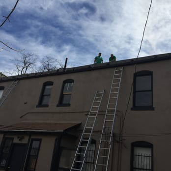 Denver Gutter Cleaning - New back gutter installation on a building in Denver CO - Gutter Services Near Me - Denver, Colorado