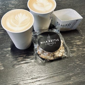 Fabled Bookshop & Cafe - Cardamom latte, lavender brown sugar latte, and milk bottle ginger crinkle cookie. - Cafes Near Me - Waco, Texas Fabled Bookshop & Cafe - Cardamom latte, lavender brown sugar latte, and milk bottle ginger crinkle cookie. - Cafes Near Me - Waco, Texas