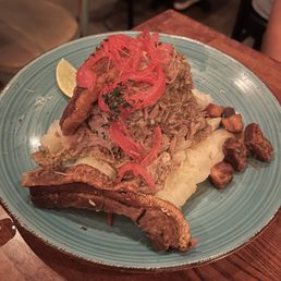 Lechón and yuca. Lechón and yuca.