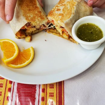 Cocina Oaxaqueña - Breakfast burrito cut open. Look at that cheese! - Mexican Near Me - Eureka, California Cocina Oaxaqueña - Breakfast burrito cut open. Look at that cheese! - Mexican Near Me - Eureka, California