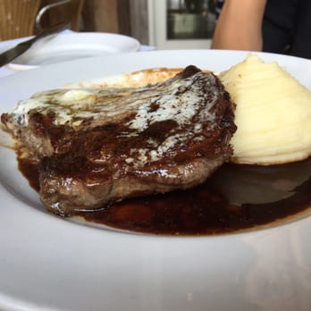 Firefly Grill - Ribeye with blue cheese butter and whipped mash - Steakhouses Near Me - Effingham, Illinois Firefly Grill - Ribeye with blue cheese butter and whipped mash - Steakhouses Near Me - Effingham, Illinois