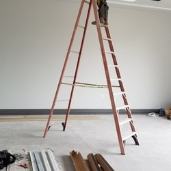 Creative Electric - Tall ceilings with highly efficient LED lighting in a custom garage
