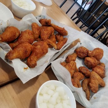 Bonchon Fort Lee - Large Combo: half spicy (left) & half soy garlic (right) - Asian Fusion Near Me - Fort Lee, New Jersey