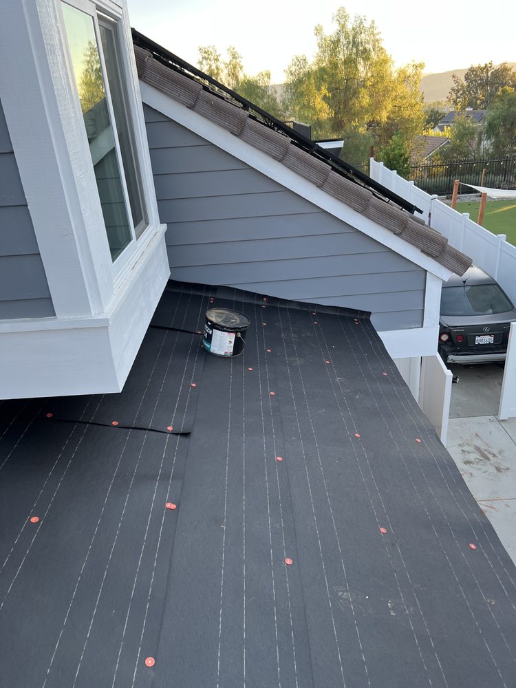 Slide of Leon K Miller Roofing