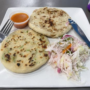 Los Catrachos - Loroco & chicharon pupusas, salsa and spicy slaw. - Honduran Near Me - Yakima, Washington Los Catrachos - Loroco & chicharon pupusas, salsa and spicy slaw. - Honduran Near Me - Yakima, Washington