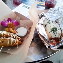 9th Ave Street Food - LEFT: Chicken Quinada, stuffed with quinoa, plantains on the side and an avocado drizzle.
RIGHT: The Longway, open face turkey meatball sub